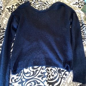 Navy blue sweater with crossed back